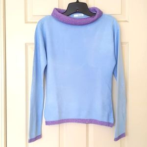 NWOT. Woman's one word collar sweater with shining and sparkling trim.